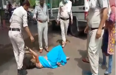 mp viral video, mp police, bjp government, women thrashed on road, sagar police, corona