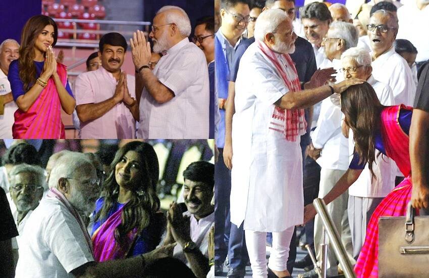 Shilpa Shetty Narendra Modi : बॉलीवुड एक्ट्रेस शिल्पा शेट्टी के पति और बिजनेसमैन राज कुंद्रा (Raj Kundra) पुलिस गिरफ्त में हैं। उनपर पोर्न फिल्मों के व्यापार का आरोप है। राज कुंद्रा की गिरफ्तारी के बाद से ही शिल्पा शेट्टी भी सोशल मीडिया यूजर्स के निशाने पर आ गई हैं। पीएम नरेंद्र मोदी के साथ उनकी कुछ तस्वीरें शेयर कर उन्हें ट्रोल किया जा रहा है: