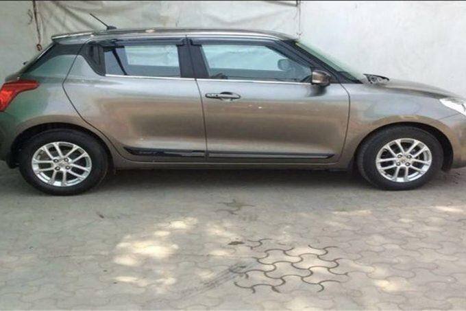 कंपनी 2018 मॉडल की Swift ZXI सेल कर रही है। Photo: True Value Website कंपनी 2018 मॉडल की Swift ZXI सेल कर रही है। Photo: True Value Website
