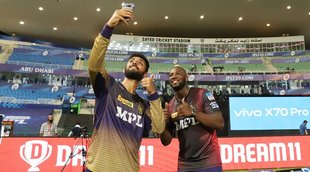 Andre Russell Varun Chakravarthy of Kolkata Knight Riders Indian Premier League 2021 Most Wickets Purple Cap1