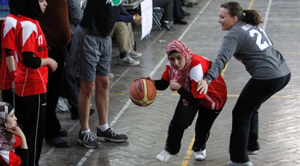 Players Afghan Women Olympic Basketball Team United States Embassy Kabul women basketball game ISAF Kabul