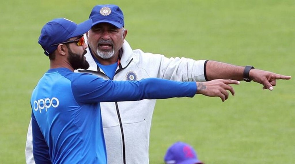 Virat Kohli with Indias bowling coach Bharat Arun