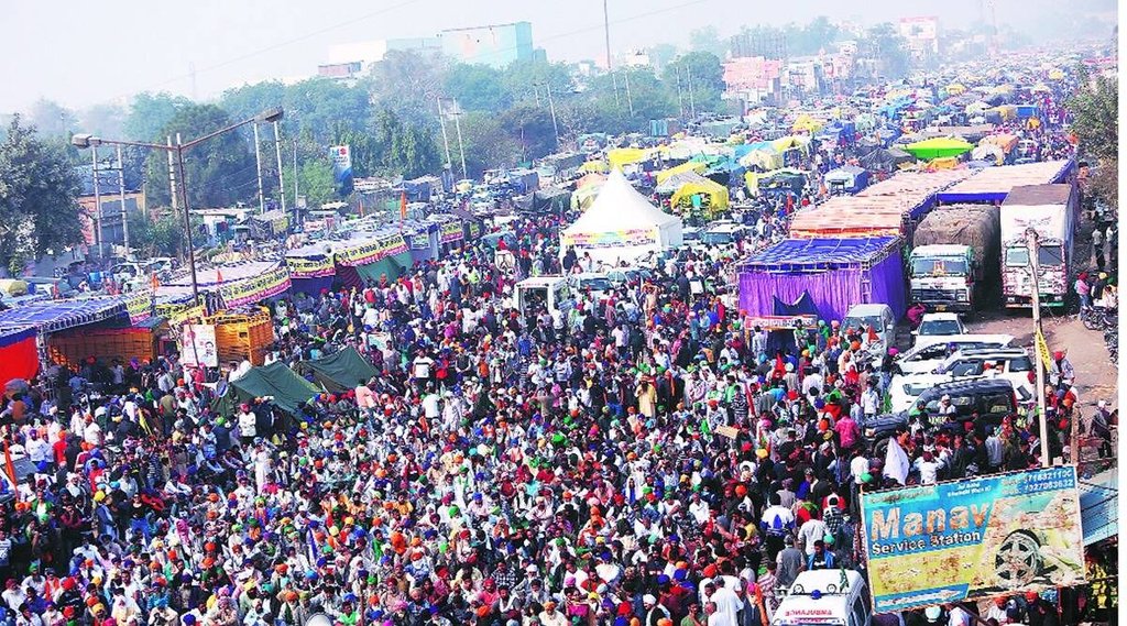 अपनी मांगों को लेकर प्रदर्शन करते किसान।