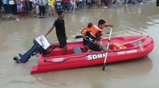 Assam, Brahmaputra boat capsize, Minister forced to sit on road, Protests in Majuli