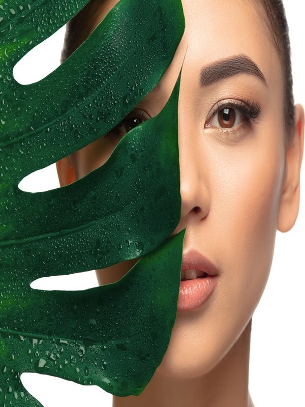 Beautiful young woman's portrait isolated white background. Cosmetics and makeup, natural and eco treatment, skin care.