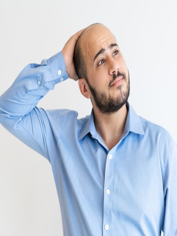 Pensive tired manager thinking over vacation