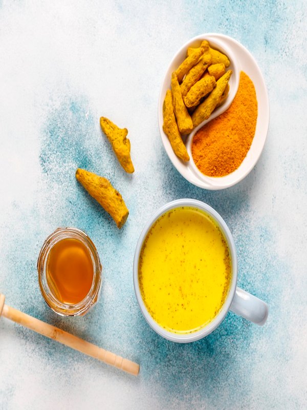 Traditional indian drink turmeric golden milk .