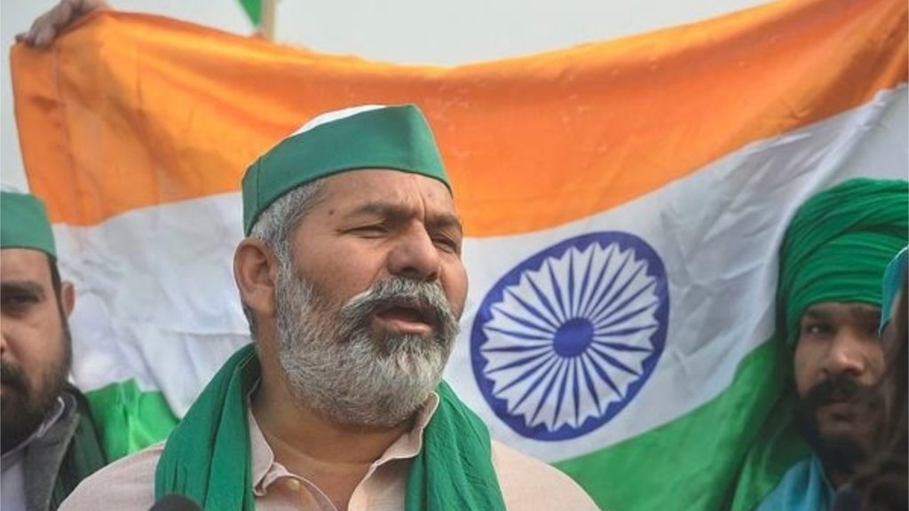 किसान नेता राकेश टिकैत ने कहा कि प्रधानमंत्री मोदी ने शहद से भी मीठी बात कही है और उनको इतना मीठा नहीं होना चाहिए। (फोटो: पीटीआई) किसान नेता राकेश टिकैत ने कहा कि प्रधानमंत्री मोदी ने शहद से भी मीठी बात कही है और उनको इतना मीठा नहीं होना चाहिए। (फोटो: पीटीआई)