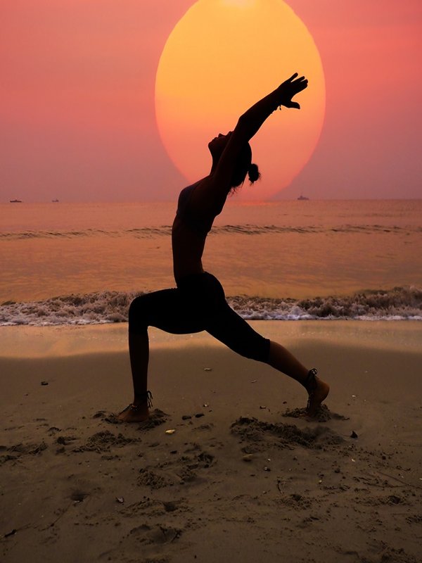 woman practicing yoga