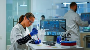 scientist-modern-equipped-medical-laboratory-examinining-drug-discovery-with-micropipette-medical-stuff-examining-vaccine-evolution-using-high-tech-technology-researching-treatment-developmen