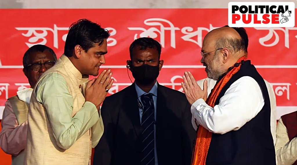 जनसभा के दौरान शांतनु ठाकुर के साथ गृह मंत्री अमित शाह। (एक्सप्रेस फोटो: पार्थ पॉल)