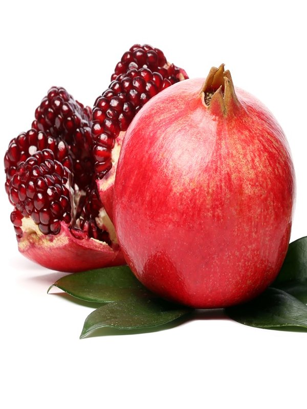 Exotic and delicious pomegranate on white background