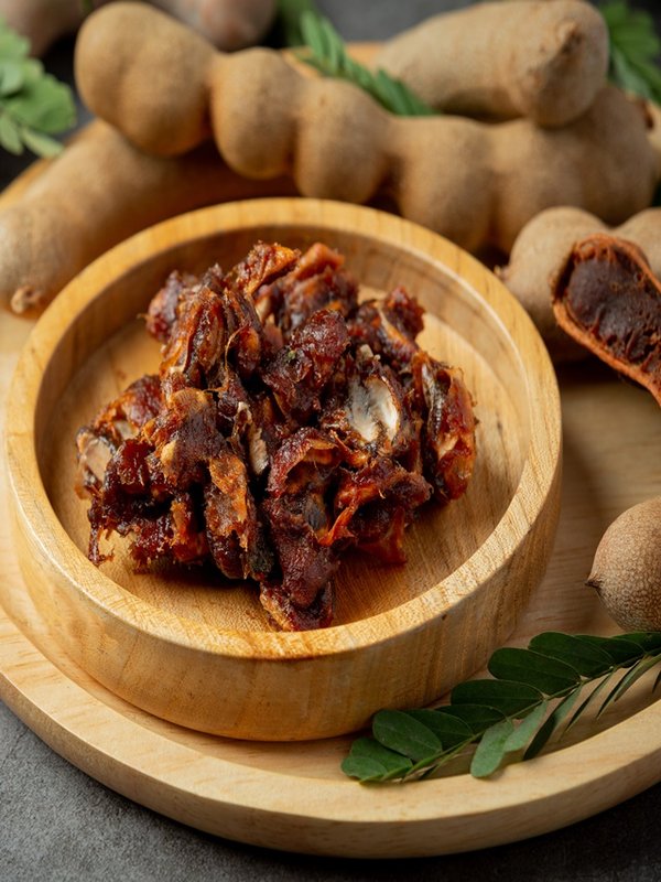 fresh sweet ripe tamarind on dark backgroud