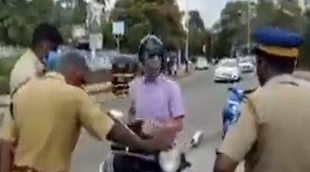 Kerala, Police empty alcohol bottle, Vijayan government, Suspended cop, Tourist