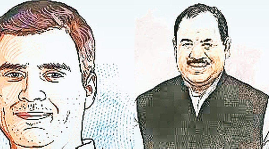 कांग्रेस के वरिष्ठ नेता राहुल गांधी और उत्तराखंड में पार्टी में हाल ही में शामिल हरक सिंह रावत।