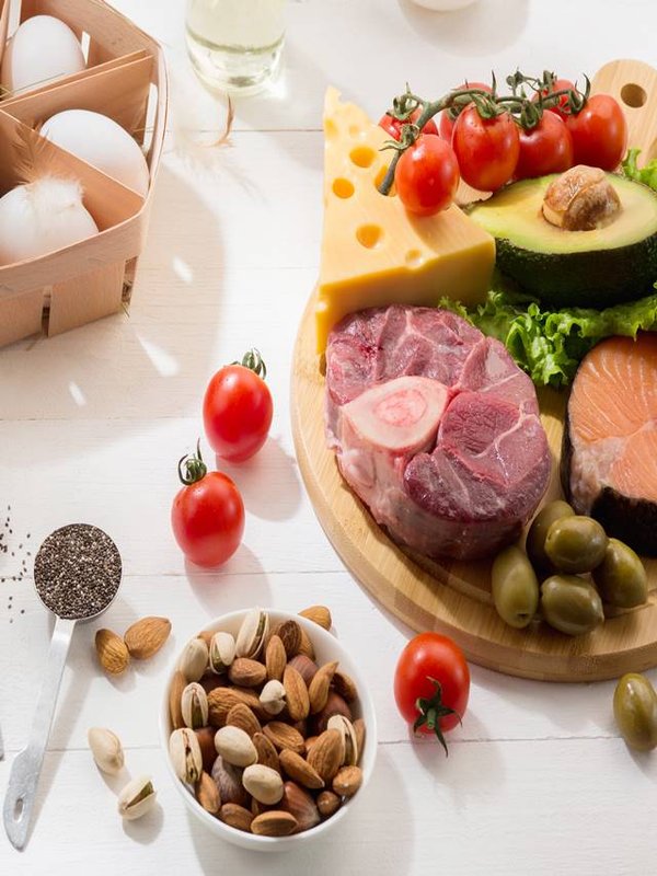 Ketogenic low carbs diet - food selection on white background