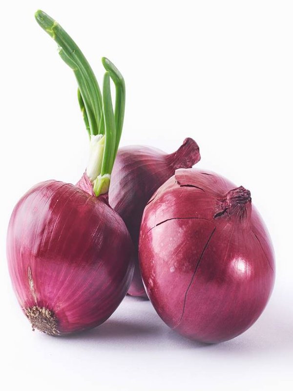 Red onion whole, isolated on white background