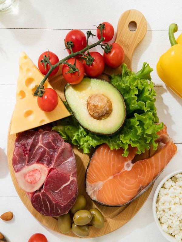 Ketogenic low carbs diet - food selection on white background
