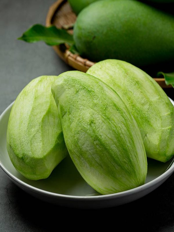 fresh green mango on dark backgroud