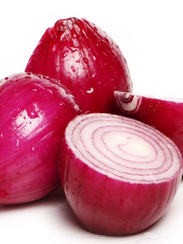 Red onion over white background