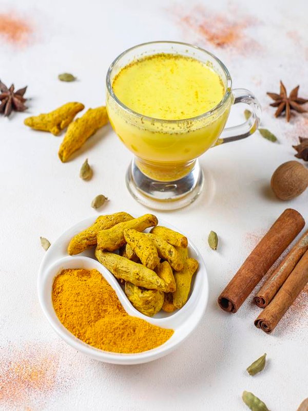 Traditional indian drink turmeric golden milk .