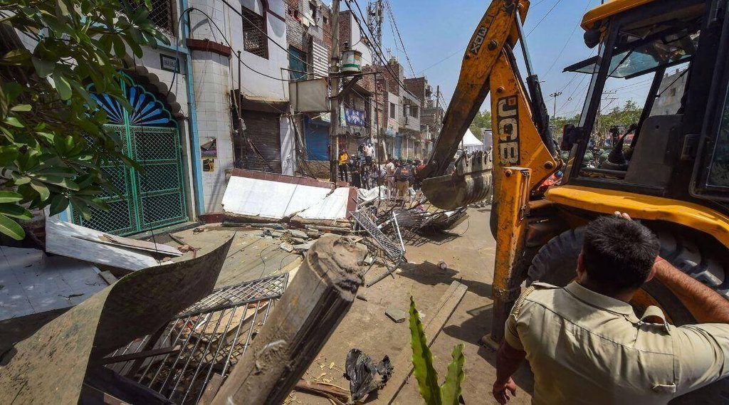 bulldozer, kapil sibal, sc