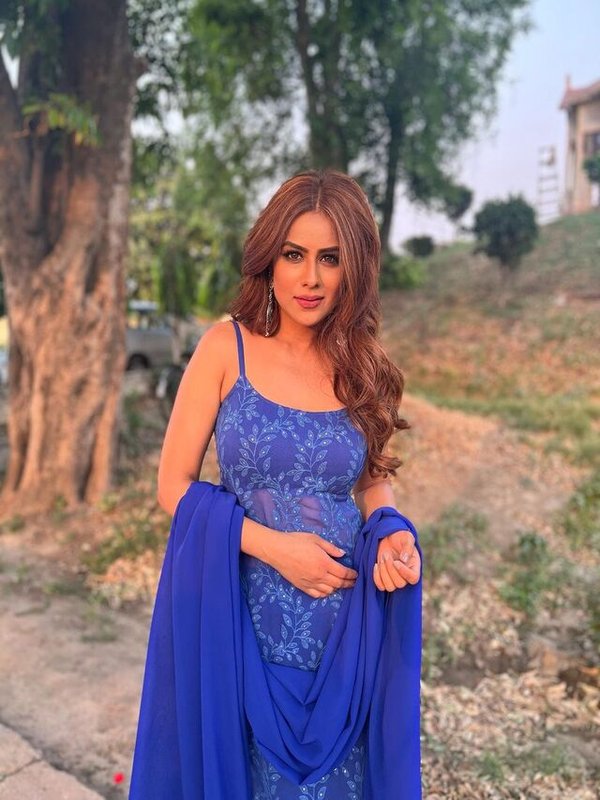 NIA SHARMA IN TRANSPARENT BLUE SUIT