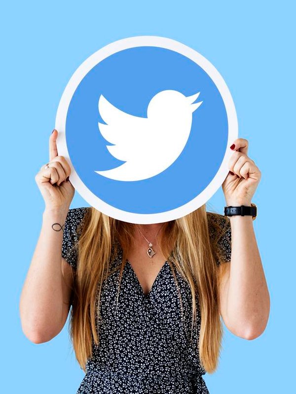 Woman holding a social network icon