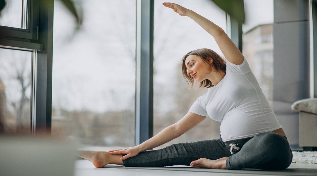 pregnant woman | practicing yoga | Pregnant Lady