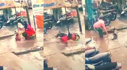 यूपीः पत्नी को स्कूटी पर लेकर जा रहा शख्स स्कूटी समेत मेन होल में गिरा, लोगों ने उठाए योगी के स्मार्ट सिटी पर सवाल