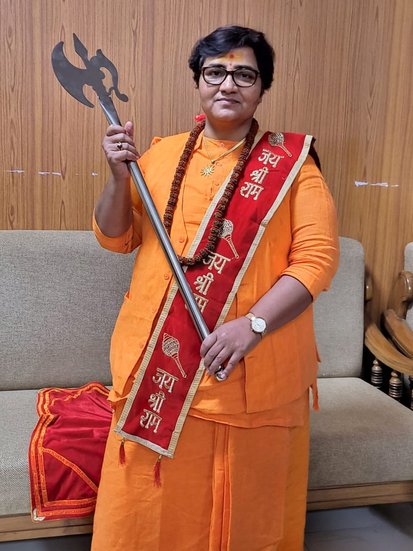 Sadhvi Pragya Thakur: एक बार मीडिया के सामने साध्वी प्रज्ञा ने नाथूराम गोडसे को देशभक्त बताया था। उन्होंने कहा था, 'गोडसे देशभक्त थे, हैं और रहेंगे।' उन्होंने यह भी कहा कि गोडसे को आतंकवादी कहने वाले स्वयं के गिरेबां में झांककर देखें। इस बयान पर काफी हंगामा हुआ था। पीएम नरेंद्र मोदी ने कहा था कि वह साध्वी प्रज्ञा को कभी मन से माफ नहीं कर पाएंगे।