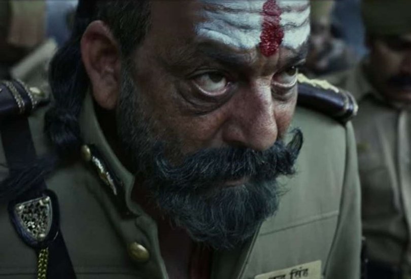 Shamshera Trailer Out: रणबीर कपूर (Ranbir Kapoor), संजय दत्त (Sanjay Dutt) और वाणी कपूर (Vaani Kapoor) की फिल्म 'शमशेरा' (Shamshera) का ट्रेलर रिलीज हो चुका है। इस फिल्म से रणबीर कपूर (Ranbir Kapoor Look in Shamshera) और संजय दत्त (Sanjay Dutt Look in Shamshera) का लुक सामने आने के बाद से इनके फैंस फिल्म देखने के लिए उत्साहित हो गए हैं। इस फिल्म में भी संजय दत्त विलेन का ही किरदार निभा रहे हैं। उनके किरदार का नाम दारोगा शुद्ध सिंह है। (Photo: यह फिल्म का स्क्रीनशाॅट है)