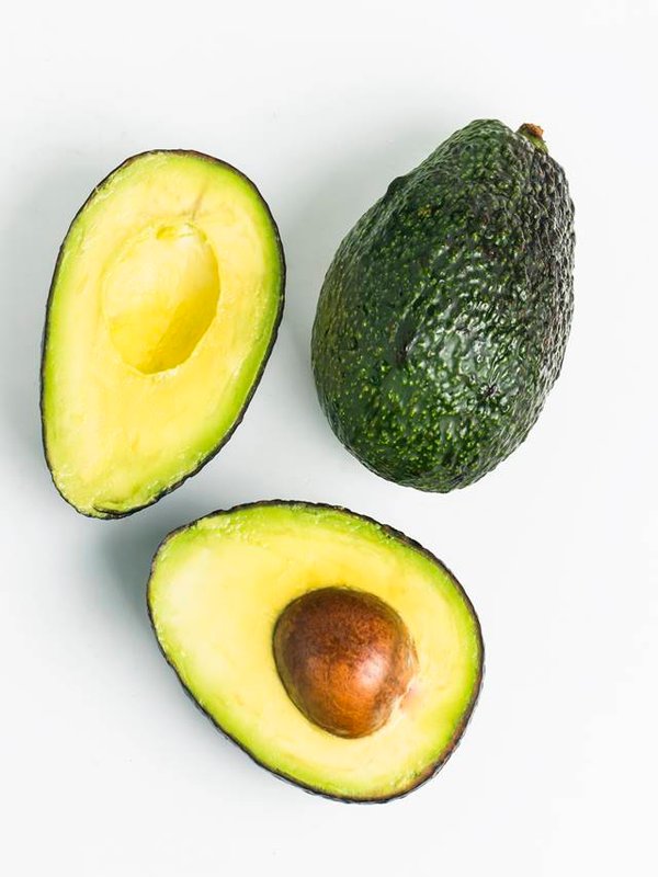 avocado on a dark wood background