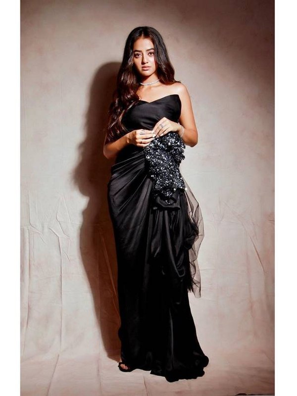 helly in black dress