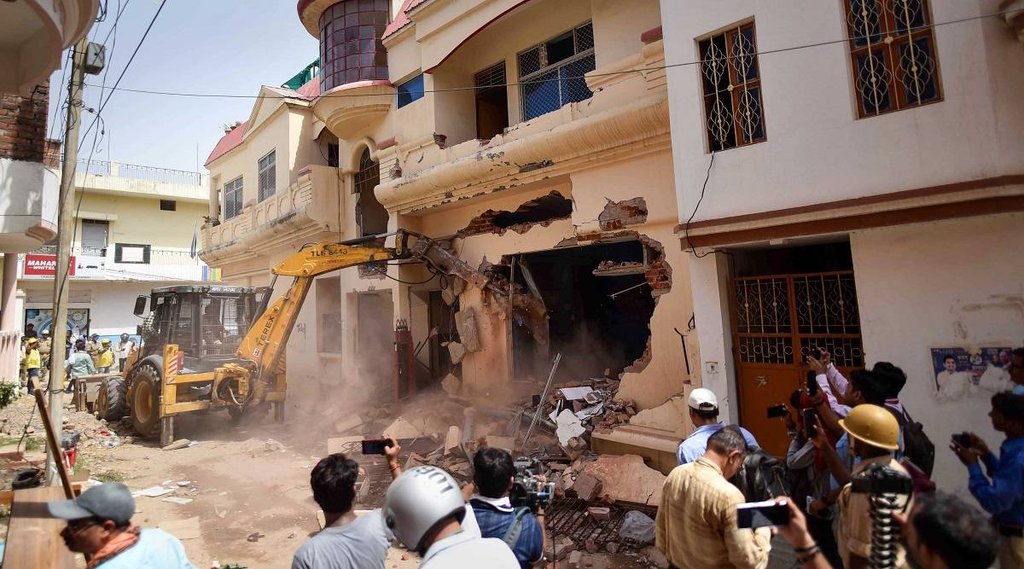 owaisi, javed pump, bulldozer