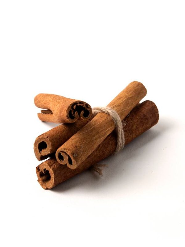 Cinnamon sticks wrapped with a rustic thread