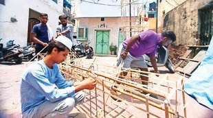 bulldozer-shaped kanwar, Sawan