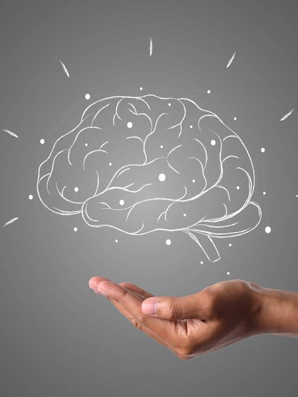 brain writes with white chalk is on hand, draw concept.