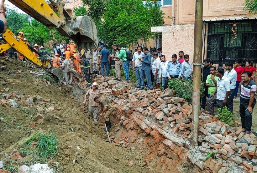 Noida housing society wall collapses, indian express