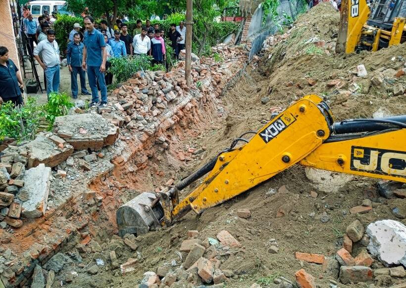 Noida housing society wall collapses, indian express