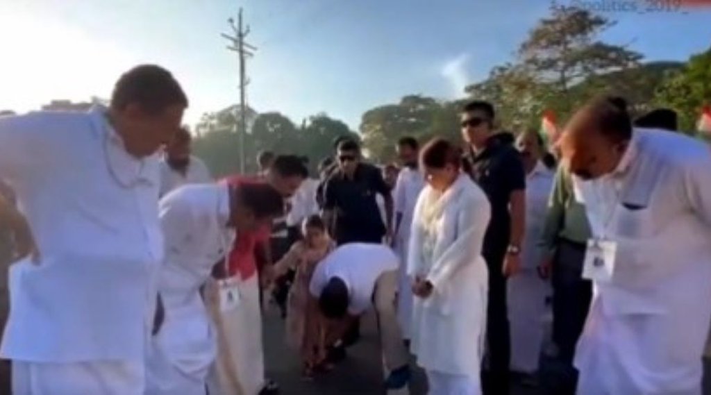 bharat jodo yatra, rahul gandhi helping little girl, rahul gandhi wear sandal little girl