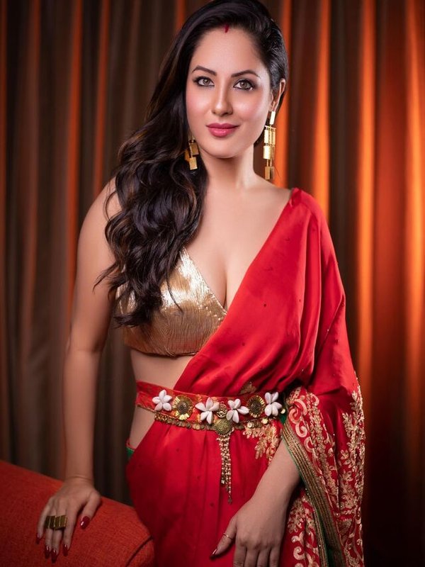 DEEP CUT BLOUSE AND RED SAREE LOOK OF PUJA BANERJEE