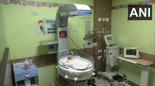 delhi news| newborn in garbage| rainfall