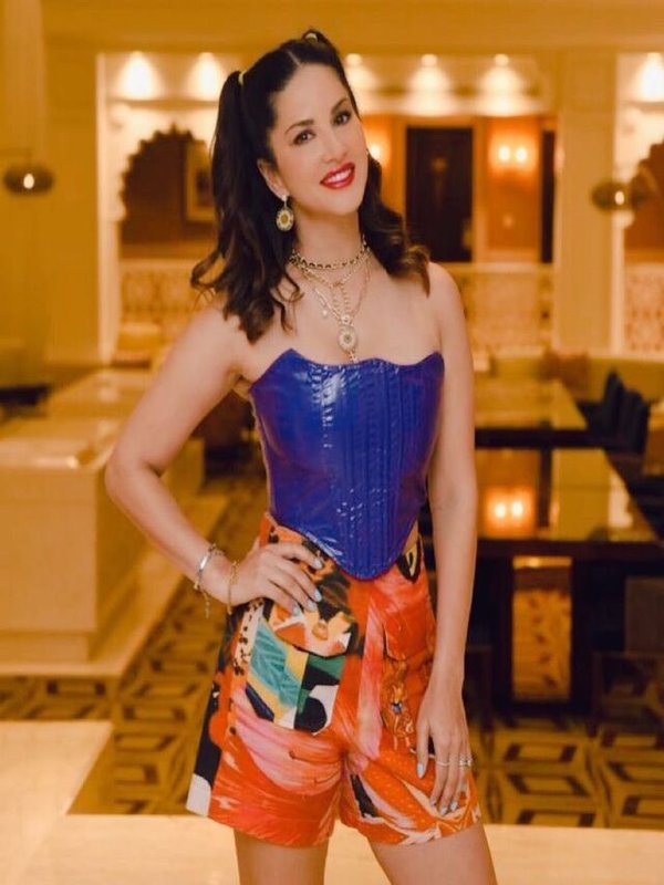 SUNNY LEONE IN BLUE SHIMMER TOP LOOK