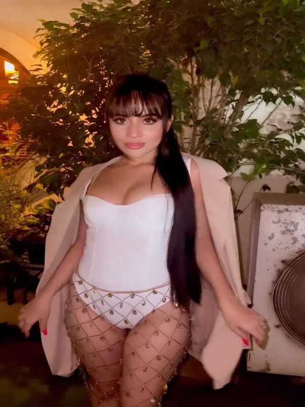 URFI JAVED IN WHITE BODYCON DRESS