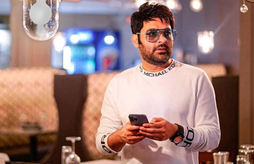 Kapil Sharma Using Mobile