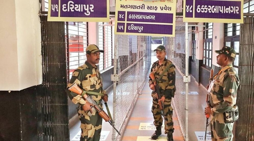 अहमदाबाद में मंगलवार को ईवीएम स्ट्रांग रूम के बाहर सुरक्षाकर्मी (Express photyo by Nirmal Harindran)