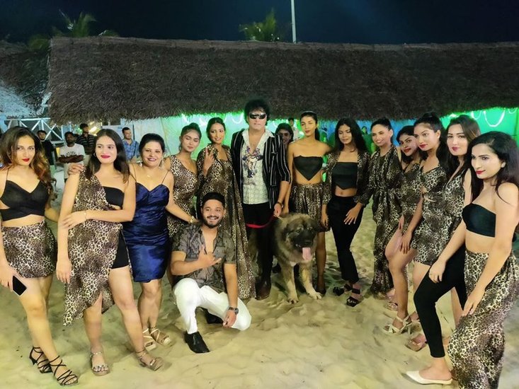 Karnataka man dog posing with models