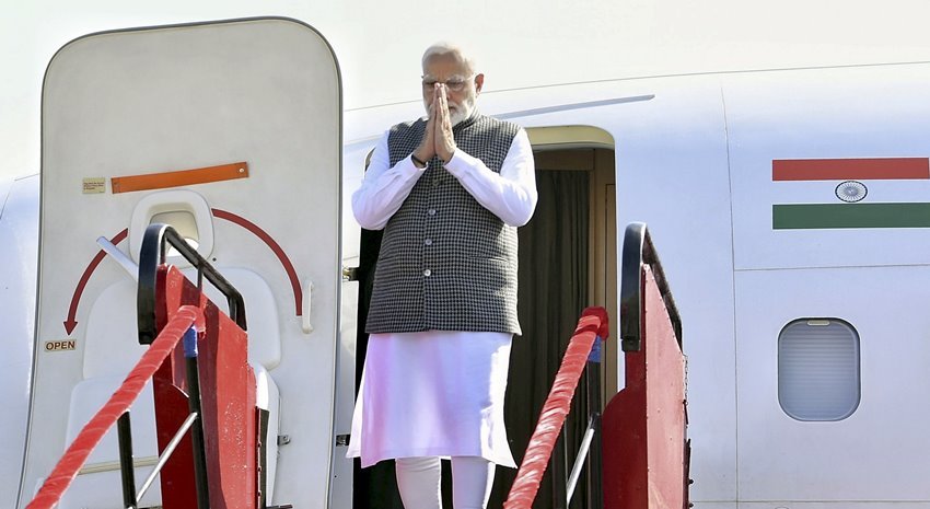 PM Narendra Modi Greets people from Aeroplane