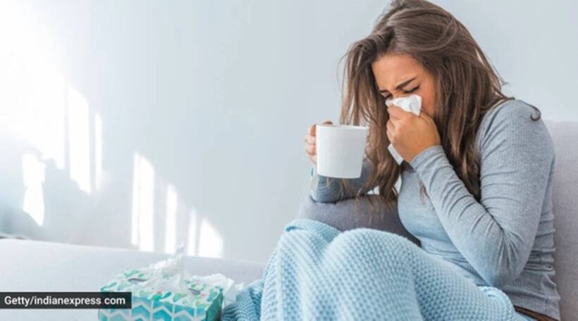 Women Sneezing in Winter